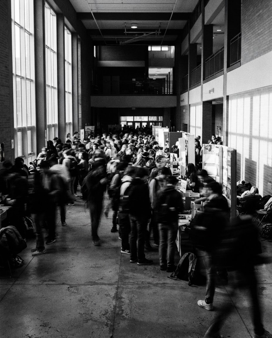 Blurred crowd at a school festival, high-grain film
